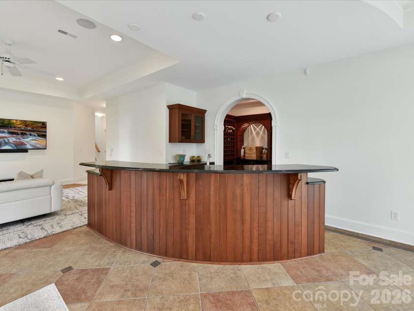 15615 McCullers Court, Charlotte, NC 28277.  MLS# CAR4367013, YatesRealty ID 17898. Lower level bar area