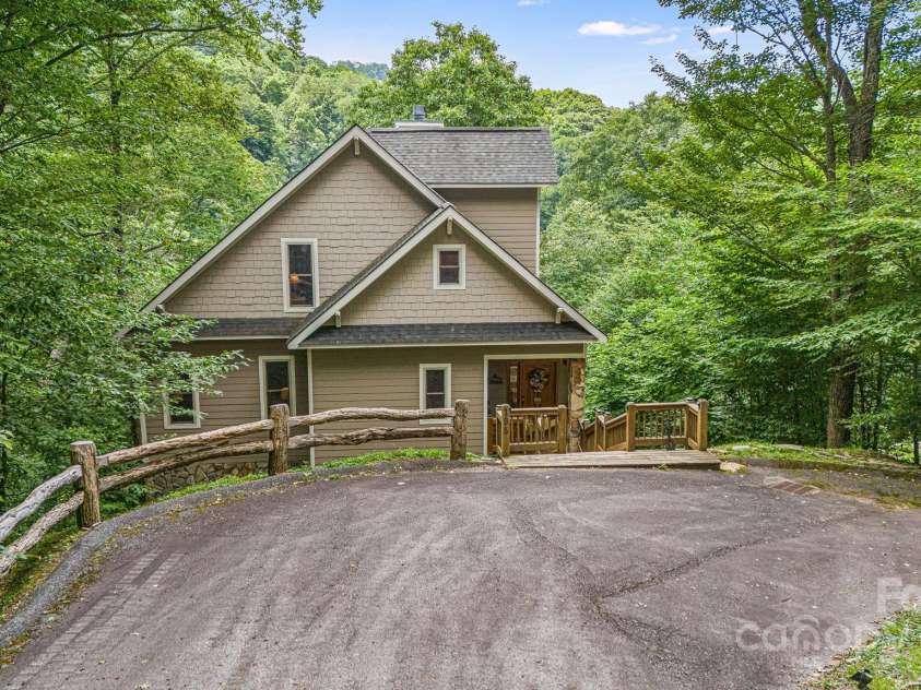 195 El Miner Court, Mars Hill, NC 28754.  MLS# CAR4174195, YatesRealty ID 179. 195 El Miner Ct nestled in the woods.