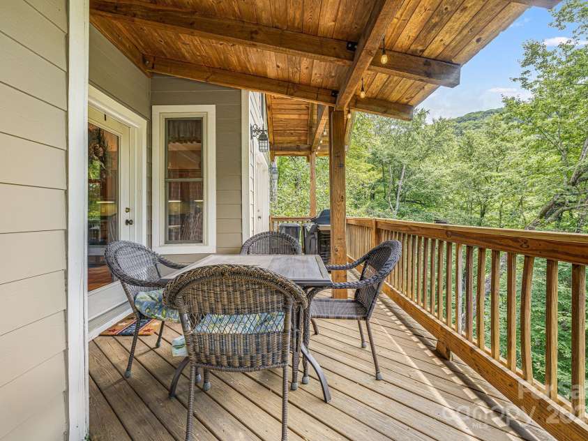 195 El Miner Court, Mars Hill, NC 28754.  MLS# CAR4174195, YatesRealty ID 179. Lower level covered deck.
