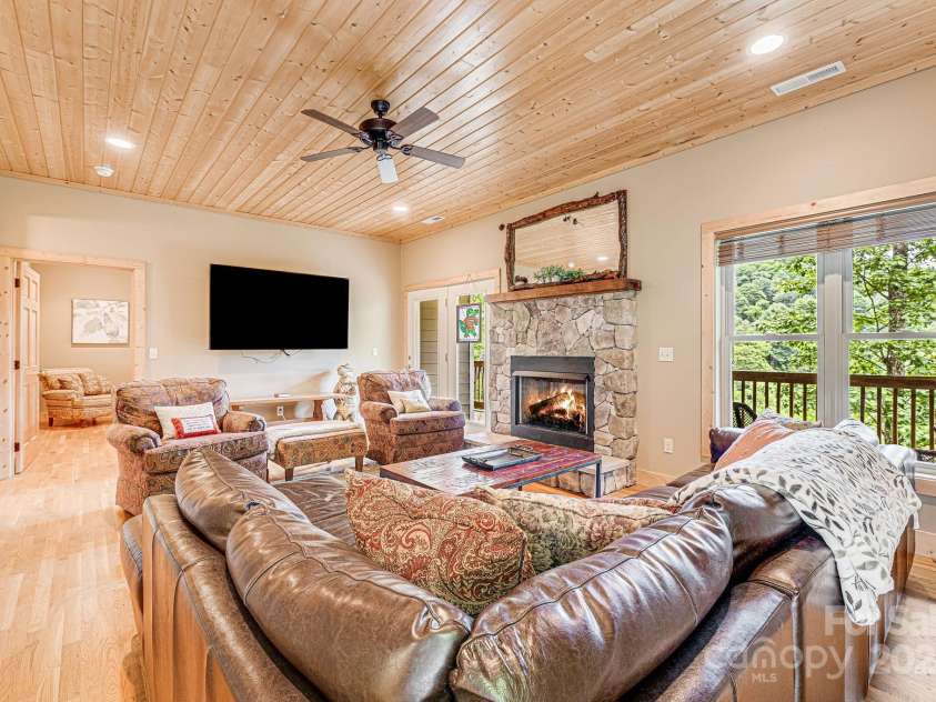 195 El Miner Court, Mars Hill, NC 28754.  MLS# CAR4174195, YatesRealty ID 179. Lower level living room