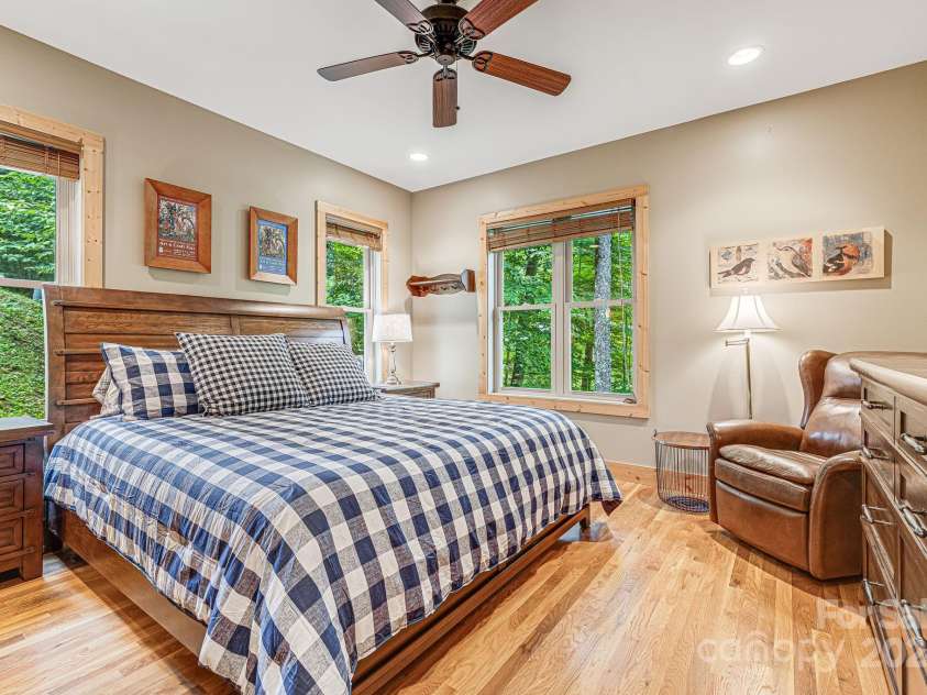 195 El Miner Court, Mars Hill, NC 28754.  MLS# CAR4174195, YatesRealty ID 179. Main level primary bedroom