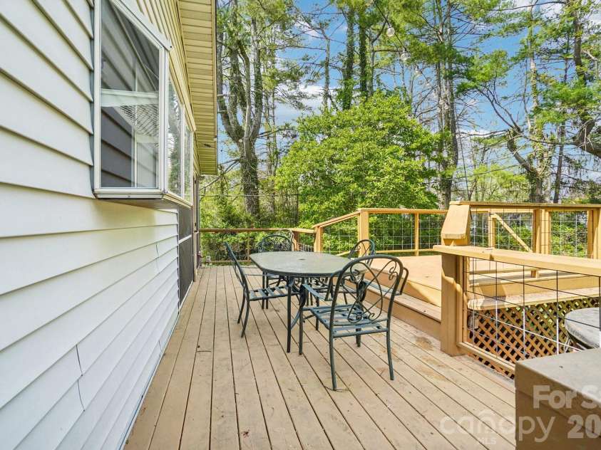 710 Heatherwood Drive, Hendersonville, NC 28792.  MLS# CAR4364577, YatesRealty ID 17900. Great Back Deck