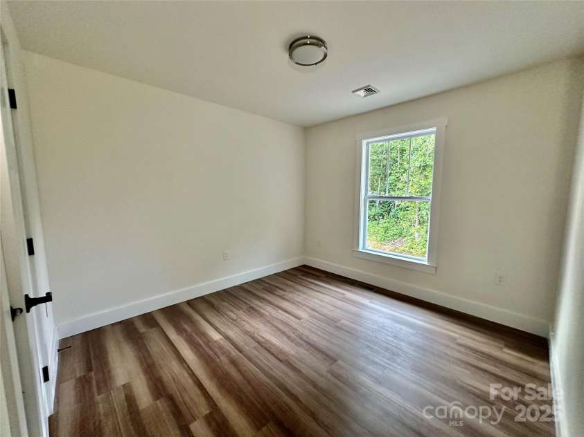 206 Cascade Ridge Road, Fairview, NC 28730.  MLS# CAR4263627, YatesRealty ID 17902. Bedroom 2