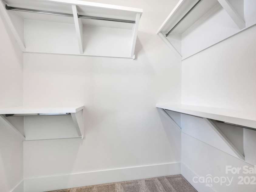 425 Delburg Mill Alley Drive, Davidson, NC 28036.  MLS# CAR4215325, YatesRealty ID 17907. Owner's Bedroom Closet