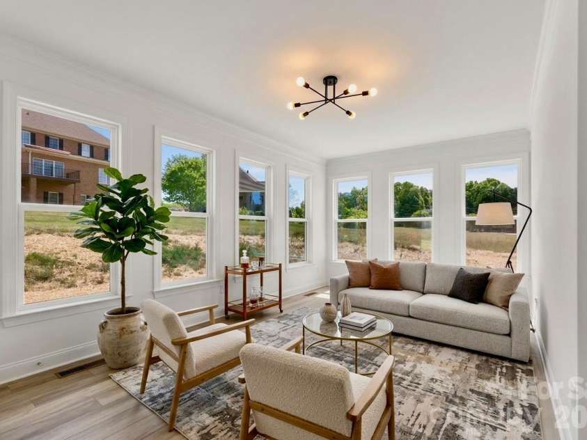 5944 Bakers Point, Hickory, NC 28602.  MLS# CAR4373457, YatesRealty ID 17910. Sun Room Staged