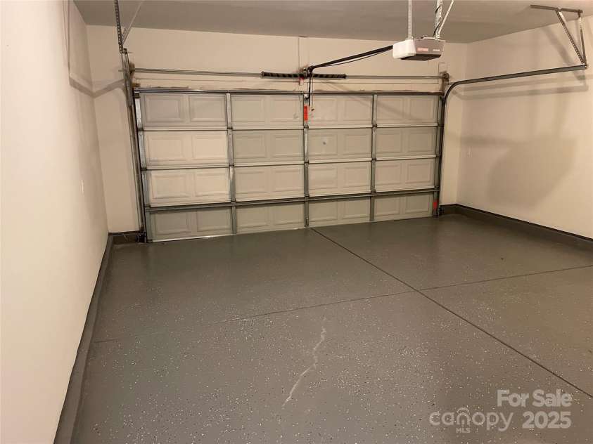 10923 Amherst Glen Drive, Charlotte, NC 28213.  MLS# CAR4250195, YatesRealty ID 17911. Finished Garage