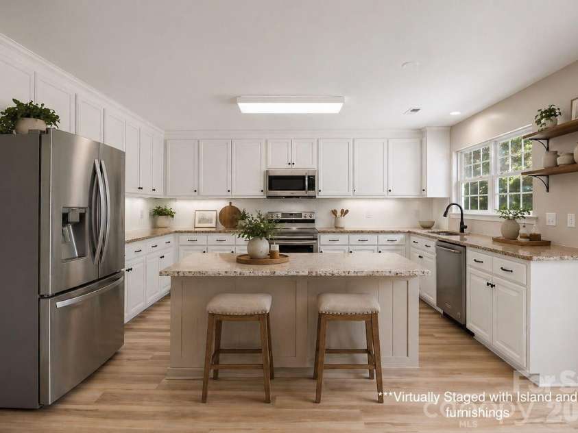 417 Deerfield Drive, Mount Holly, NC 28120.  MLS# CAR4374640, YatesRealty ID 17914. Virtually Staged
