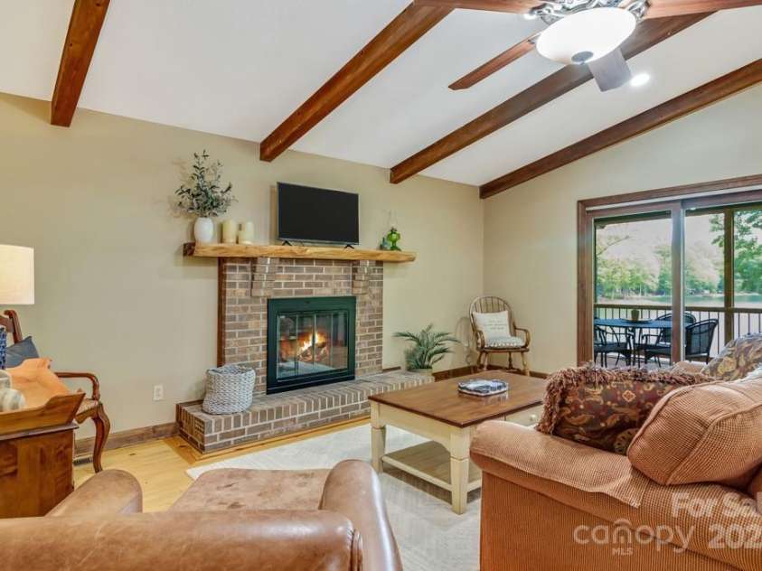 609 Haven Drive, Saluda, NC 28773.  MLS# CAR4247056, YatesRealty ID 17919. Every lake house in the mountains needs a fireplace to enjoy year round.