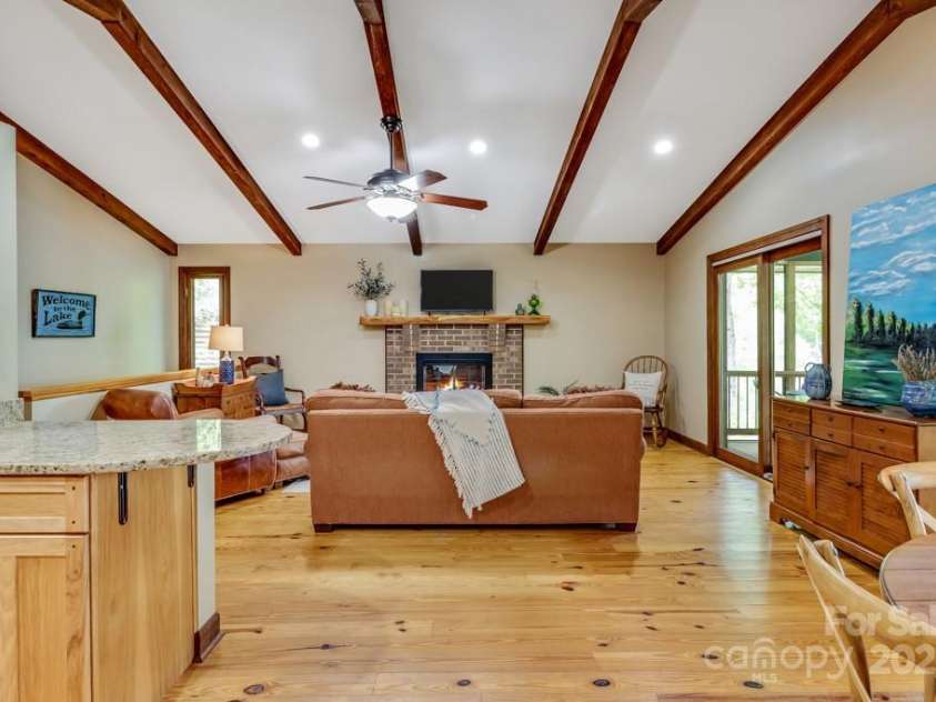609 Haven Drive, Saluda, NC 28773.  MLS# CAR4247056, YatesRealty ID 17919. Great room with beamed ceiling
