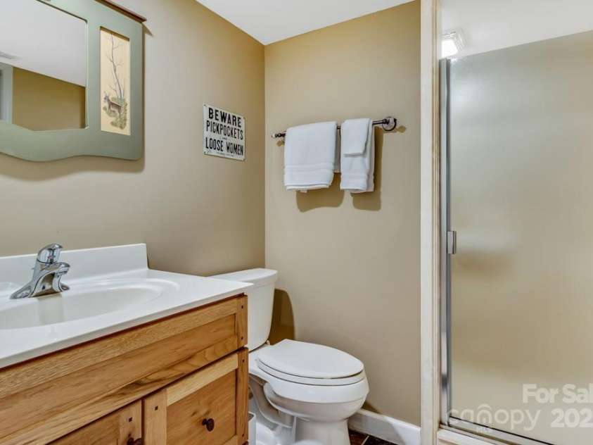 609 Haven Drive, Saluda, NC 28773.  MLS# CAR4247056, YatesRealty ID 17919. Lower Level Bathroom