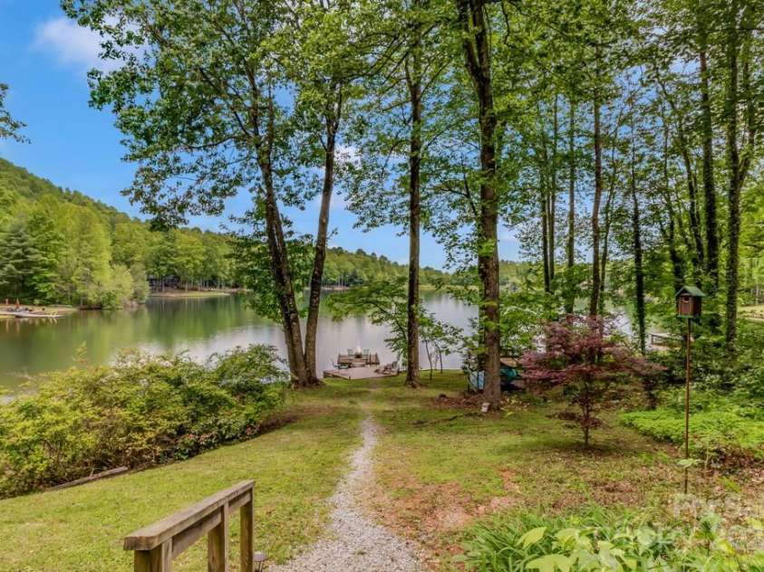 609 Haven Drive, Saluda, NC 28773.  MLS# CAR4247056, YatesRealty ID 17919. Walking out from the lower level.