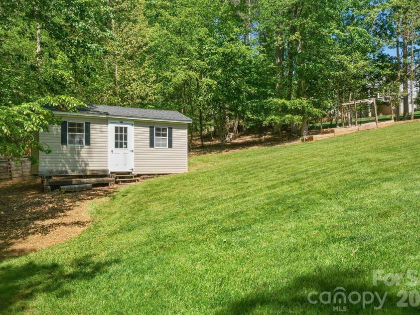 321 Winding Creek Drive, Morganton, NC 28655.  MLS# CAR4361242, YatesRealty ID 17922. Backyard storage