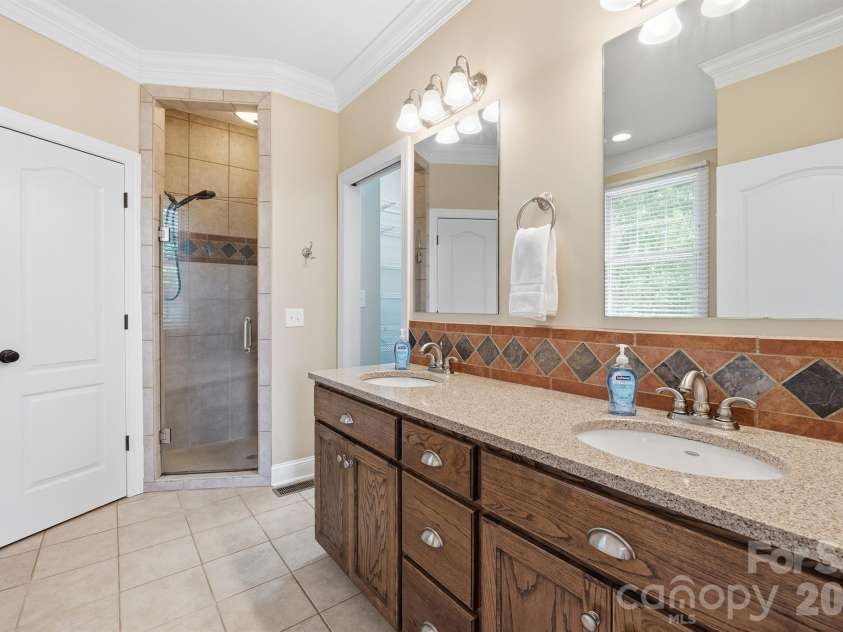 321 Winding Creek Drive, Morganton, NC 28655.  MLS# CAR4361242, YatesRealty ID 17922. Primary bathroom main level