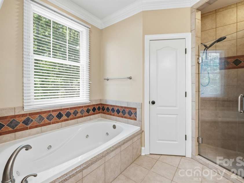 321 Winding Creek Drive, Morganton, NC 28655.  MLS# CAR4361242, YatesRealty ID 17922. Primary bathroom main level
