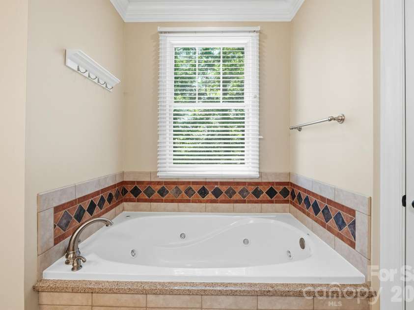 321 Winding Creek Drive, Morganton, NC 28655.  MLS# CAR4361242, YatesRealty ID 17922. Primary bathroom main level