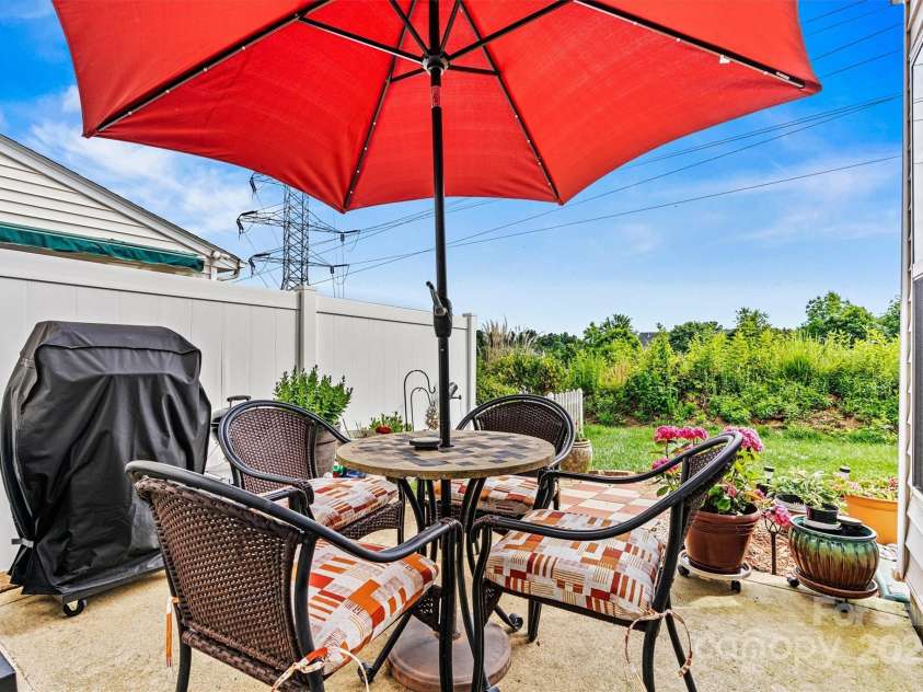 8002 Mariners Pointe Circle, Denver, NC 28037.  MLS# CAR4267345, YatesRealty ID 17926. Backyard patio, fenced on both sides
