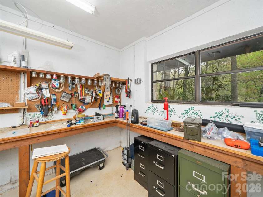 86 Laurel Drive, Burnsville, NC 28714.  MLS# CAR4253522, YatesRealty ID 17927. Workshop on Basement Level