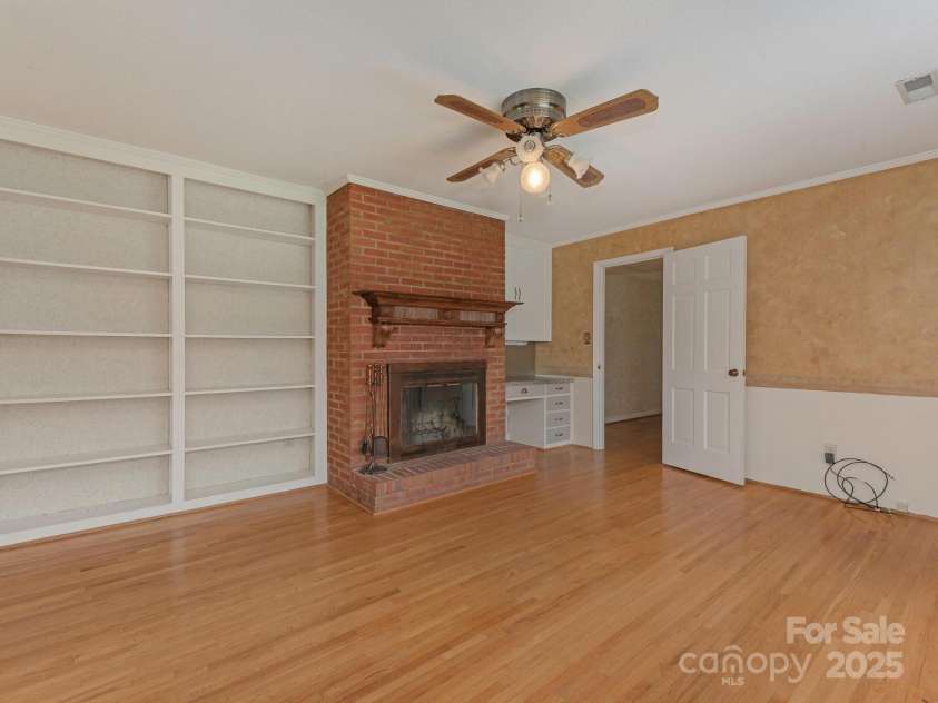 3408 Oak Tree Trail, Matthews, NC 28105.  MLS# CAR4267808, YatesRealty ID 17929. Den entrance from the hall corridor