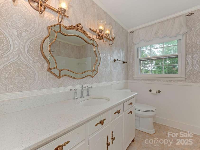 3408 Oak Tree Trail, Matthews, NC 28105.  MLS# CAR4267808, YatesRealty ID 17929. Hall bath convenient to both secondary bedrooms