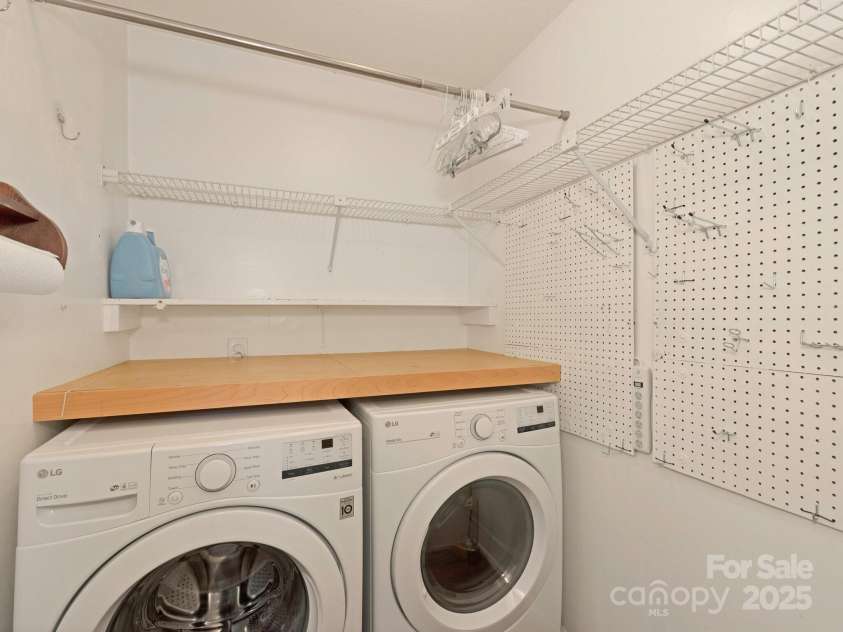 3408 Oak Tree Trail, Matthews, NC 28105.  MLS# CAR4267808, YatesRealty ID 17929. Laundry tucked in by the back entry, with additional storage