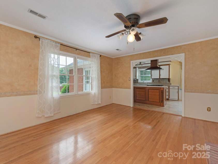 3408 Oak Tree Trail, Matthews, NC 28105.  MLS# CAR4267808, YatesRealty ID 17929. View from den into the kitchen