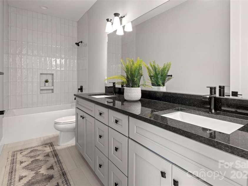 303 Iron Ridge Loop, Asheville, NC 28806.  MLS# CAR4151239, YatesRealty ID 1793. 2nd Floor Guest Bath