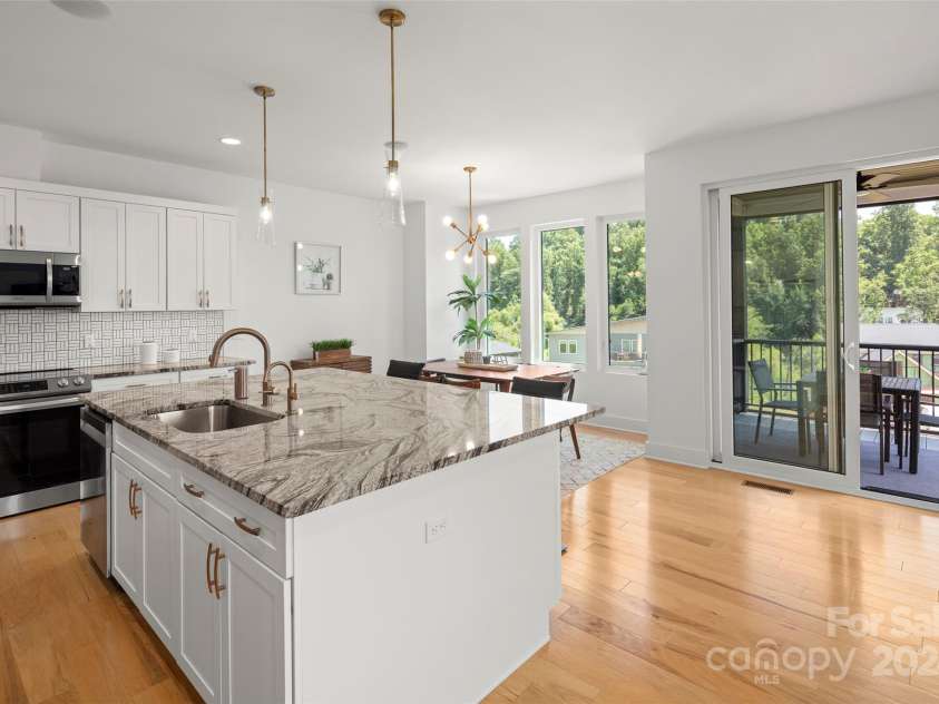 303 Iron Ridge Loop, Asheville, NC 28806.  MLS# CAR4151239, YatesRealty ID 1793. Kitchen and Dining