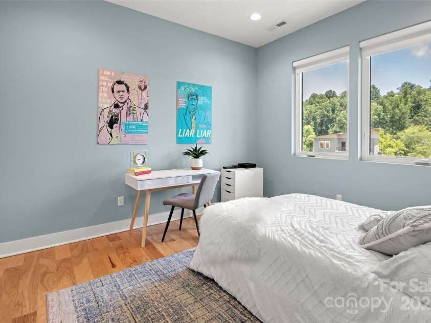 303 Iron Ridge Loop, Asheville, NC 28806.  MLS# CAR4151239, YatesRealty ID 1793. Lower Level Guest Bedroom