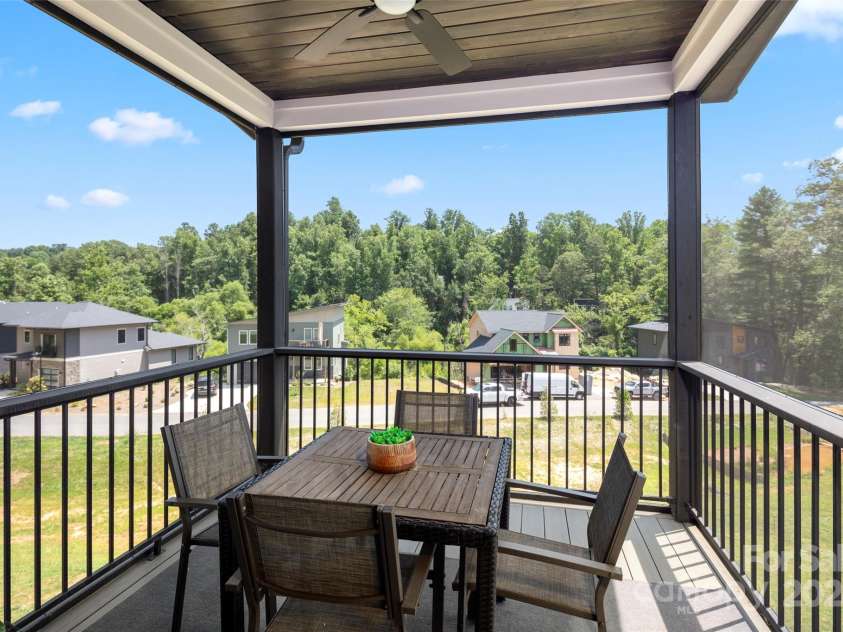 303 Iron Ridge Loop, Asheville, NC 28806.  MLS# CAR4151239, YatesRealty ID 1793. Main Level Screened in Deck