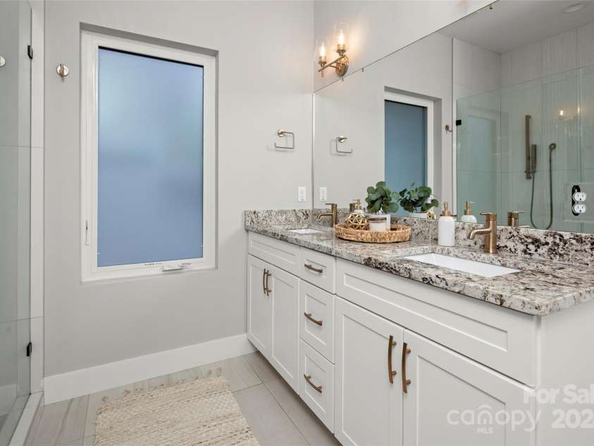 303 Iron Ridge Loop, Asheville, NC 28806.  MLS# CAR4151239, YatesRealty ID 1793. Primary Bath Vanity