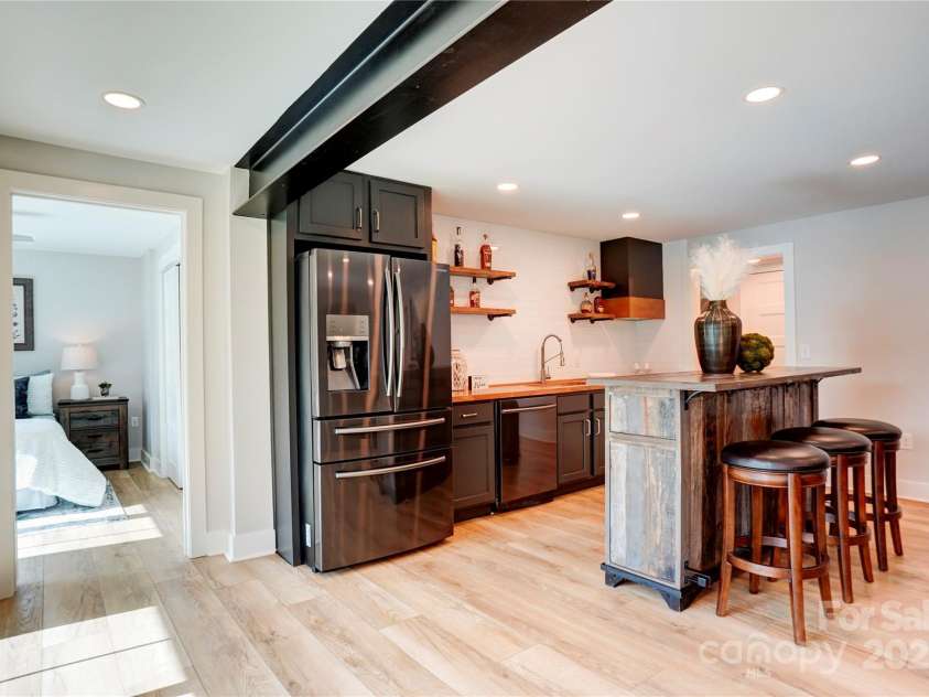 445 Sundown Road, Mooresville, NC 28117.  MLS# CAR4263161, YatesRealty ID 17931. Lower Level Kitchen