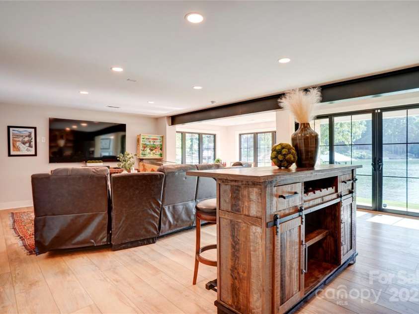 445 Sundown Road, Mooresville, NC 28117.  MLS# CAR4263161, YatesRealty ID 17931. Lower Level Living Room