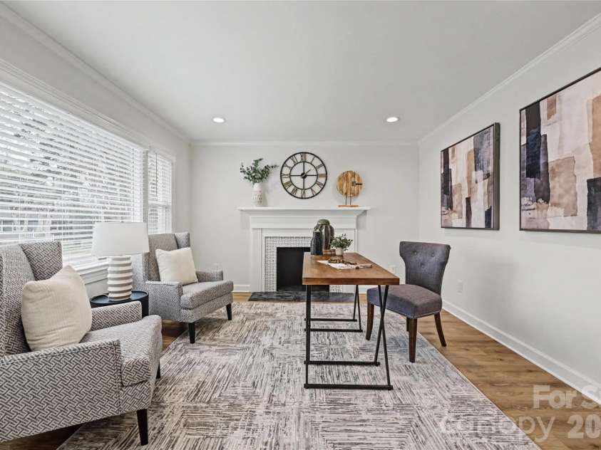 815 Hartness Avenue, Charlotte, NC 28211.  MLS# CAR4351971, YatesRealty ID 17940. Study with fireplace