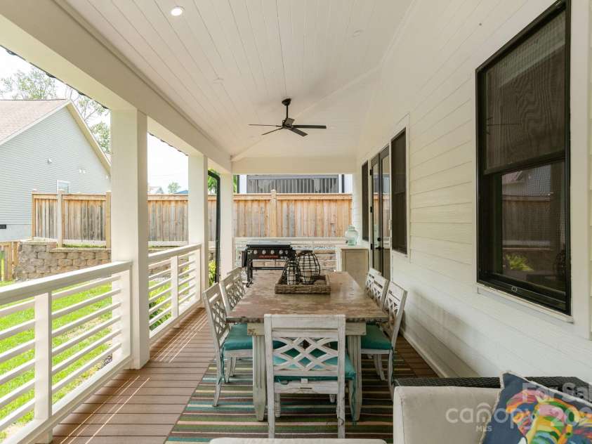 40 Hidden Pond Lane, Brevard, NC 28712.  MLS# CAR4263317, YatesRealty ID 17941. Large back deck