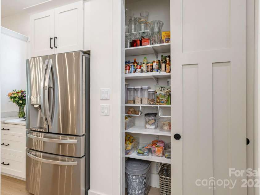 40 Hidden Pond Lane, Brevard, NC 28712.  MLS# CAR4263317, YatesRealty ID 17941. Pantry