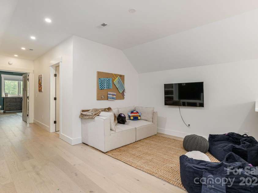 40 Hidden Pond Lane, Brevard, NC 28712.  MLS# CAR4263317, YatesRealty ID 17941. Upstairs media room