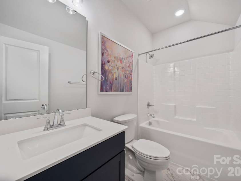 9043 Charles Francis Lane, Cornelius, NC 28031.  MLS# CAR4360316, YatesRealty ID 17944. 3rd level bathroom