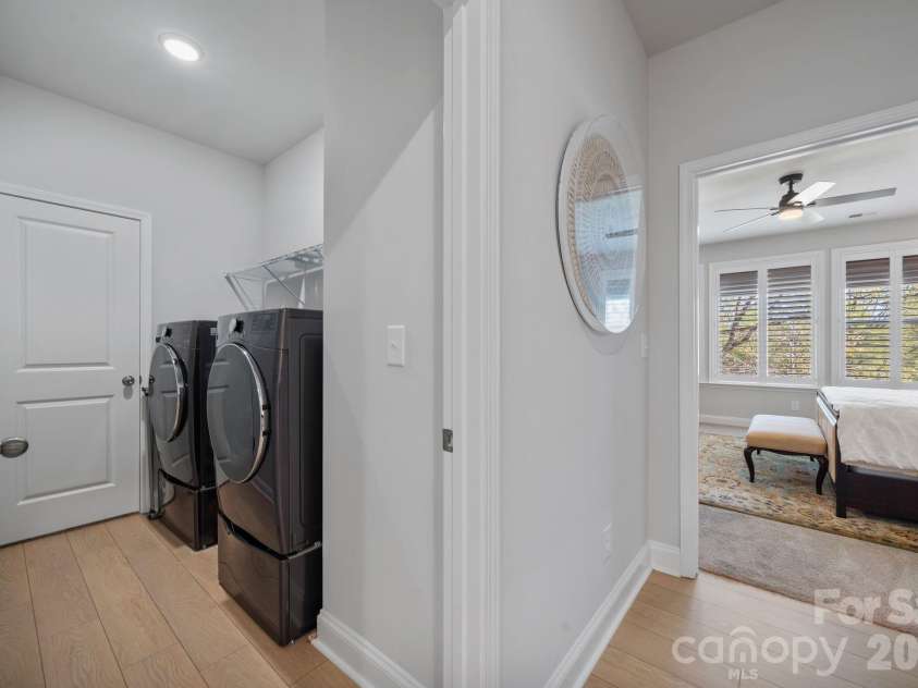 9043 Charles Francis Lane, Cornelius, NC 28031.  MLS# CAR4360316, YatesRealty ID 17944. Laundry room