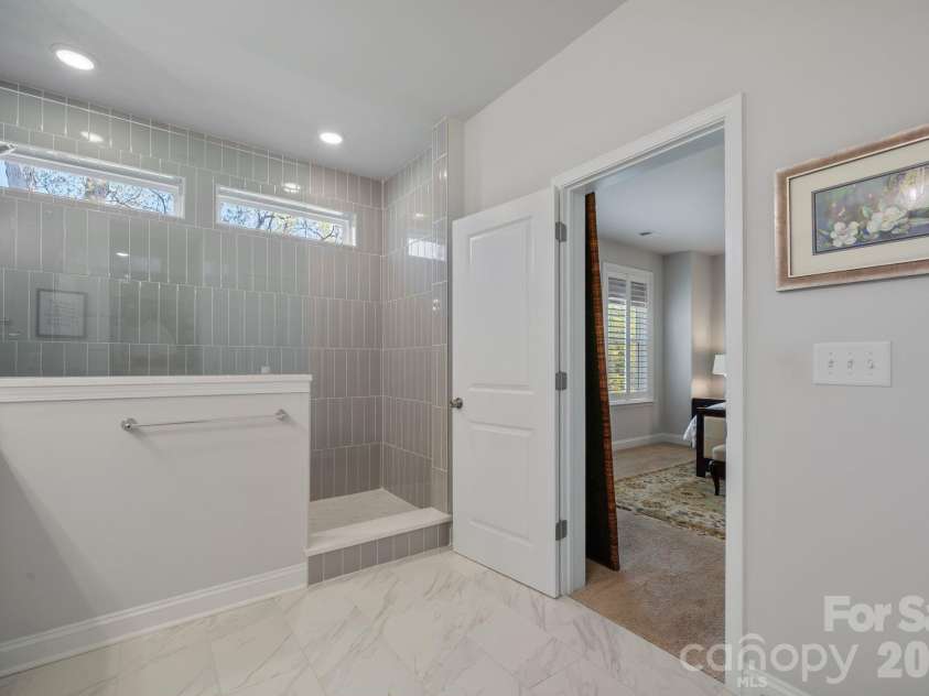 9043 Charles Francis Lane, Cornelius, NC 28031.  MLS# CAR4360316, YatesRealty ID 17944. Primary bathroom