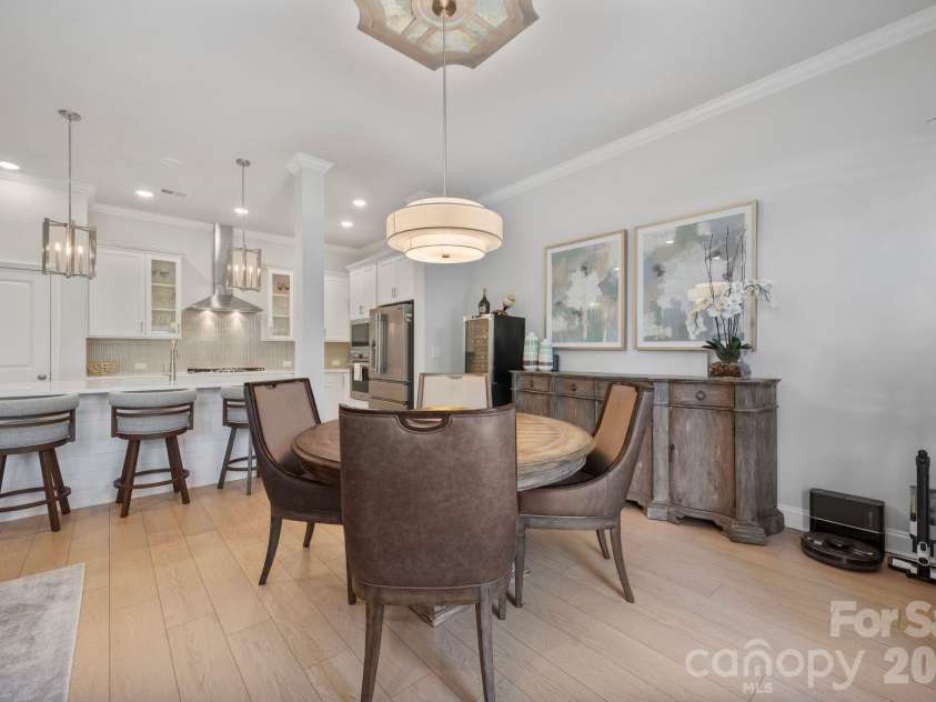 9043 Charles Francis Lane, Cornelius, NC 28031.  MLS# CAR4360316, YatesRealty ID 17944. Room for a large table