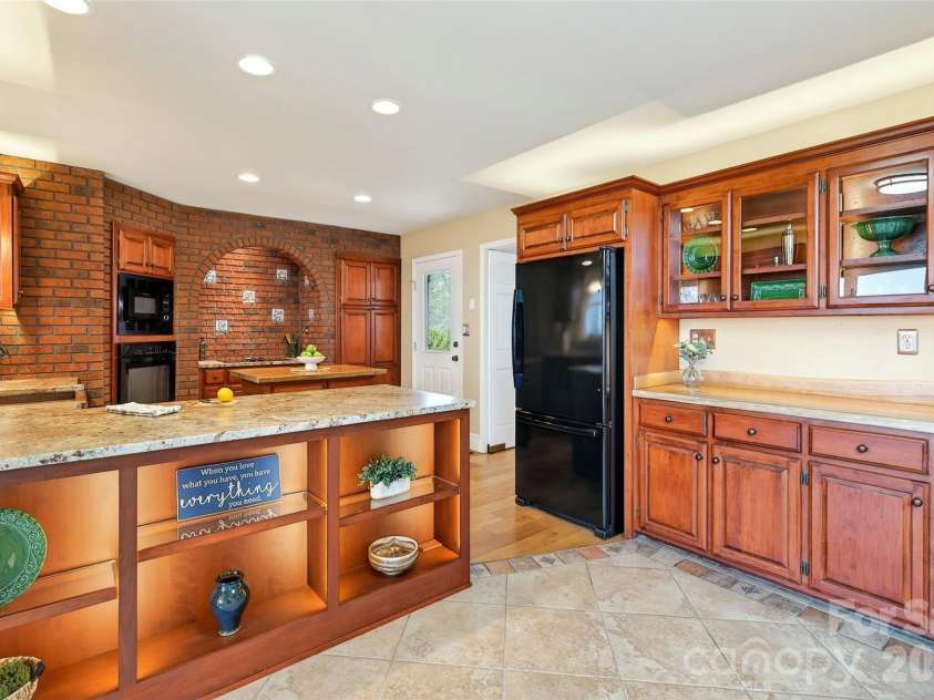 62 Skyline Drive, Old Fort, NC 28762.  MLS# CAR4364204, YatesRealty ID 17947. Ample storage in the kitchen.