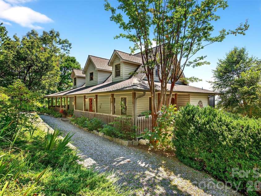 62 Skyline Drive, Old Fort, NC 28762.  MLS# CAR4364204, YatesRealty ID 17947. Home features an upper circle driveway and a lower driveway which accesses the garage.
