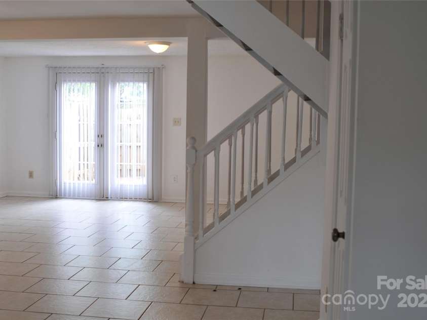 9626-C Vinca Circle, Charlotte, NC 28213.  MLS# CAR4290959, YatesRealty ID 1795. Foyer to den view