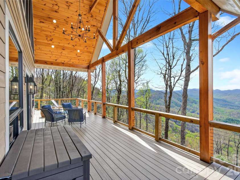 501 Wolf Pen Cliffs Road, Old Fort, NC 28762.  MLS# CAR4365894, YatesRealty ID 17951. Expansive covered wrap around decks.