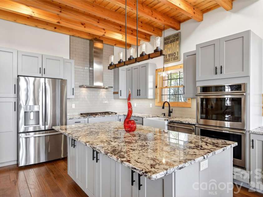 501 Wolf Pen Cliffs Road, Old Fort, NC 28762.  MLS# CAR4365894, YatesRealty ID 17951. Granite countertops.