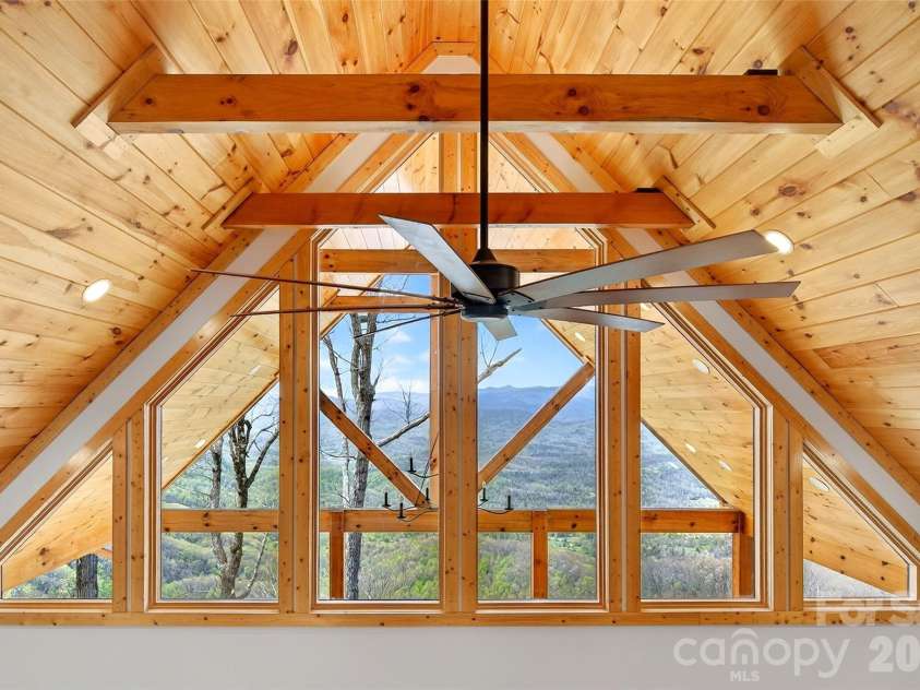 501 Wolf Pen Cliffs Road, Old Fort, NC 28762.  MLS# CAR4365894, YatesRealty ID 17951. Open timber beams.