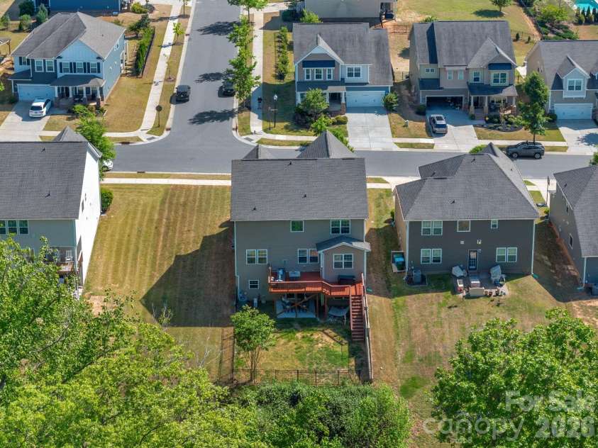 5000 Lily Pond Circle, Waxhaw, NC 28173.  MLS# CAR4369036, YatesRealty ID 17954. Basement home with privacy and natural space