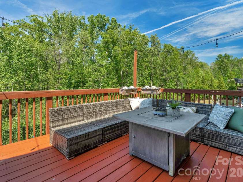 5000 Lily Pond Circle, Waxhaw, NC 28173.  MLS# CAR4369036, YatesRealty ID 17954. Deck overlooking natural space