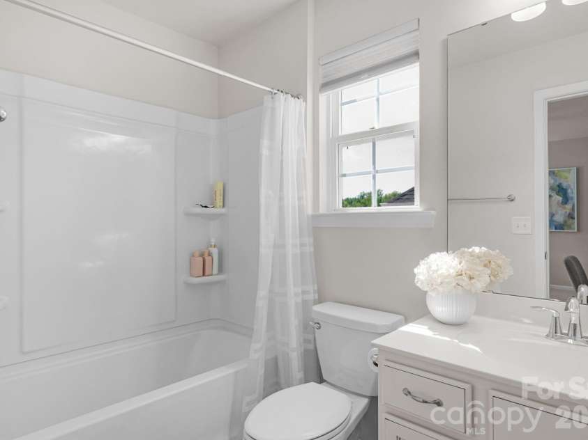 5000 Lily Pond Circle, Waxhaw, NC 28173.  MLS# CAR4369036, YatesRealty ID 17954. Second bedroom with private bathroom