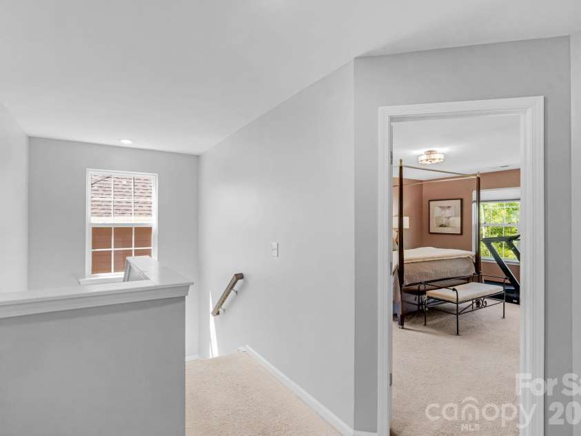 5000 Lily Pond Circle, Waxhaw, NC 28173.  MLS# CAR4369036, YatesRealty ID 17954. Second floor hallway